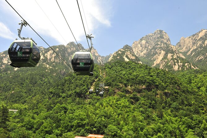 1-Day Mt. Huangshan Tour with Optional Hongcun & Xidi Village - White Goose Peak and the first sea of clouds