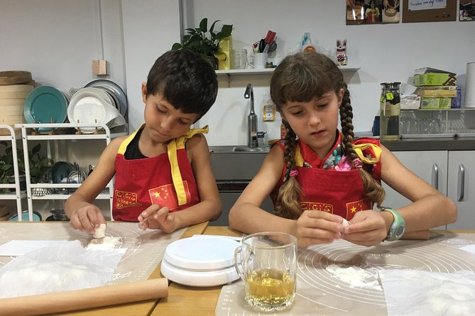 2.5hrs Chinese Kitchen Cooking Class: Xiaolongbao Soup Dumplings - The difficult part: putting soup inside