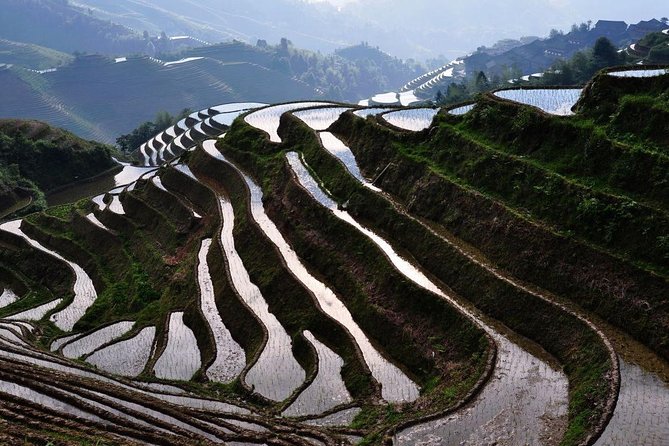 2 Day Guilin Highlights Li River Cruise and Longji Terraces Tour - Day One: The Long Ride to Longji