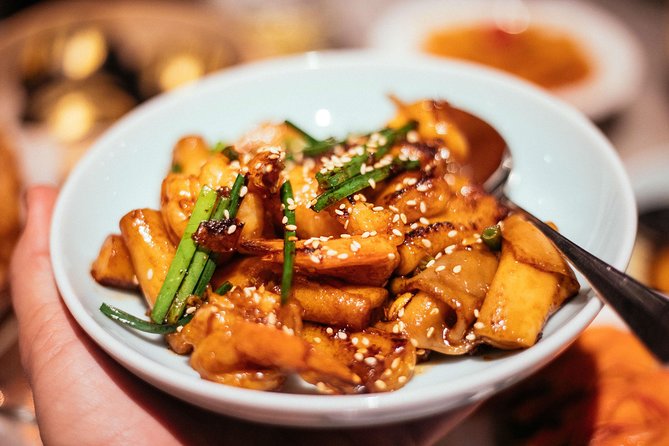 A Taste of Hong Kong: Private Tour With Locals - Ladies Market, fishballs, and shaomai