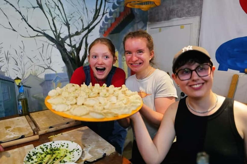 Beijing: Dumpling Making Workshop with Meal and Tea - Rolling wrappers and shaping dumplings