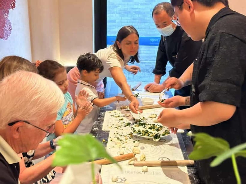 Beijing: Dumpling Making Workshop with Meal and Tea - Tea, conversation, and the communal table