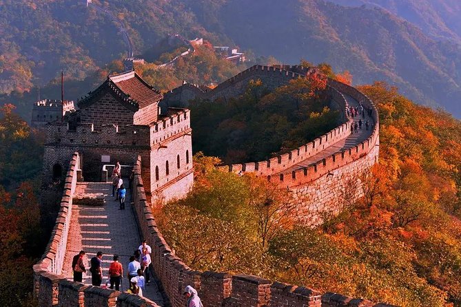 Beijing Group Coach Tour to Mutianyu Great Wall Without Lunch - What the guide adds to the day