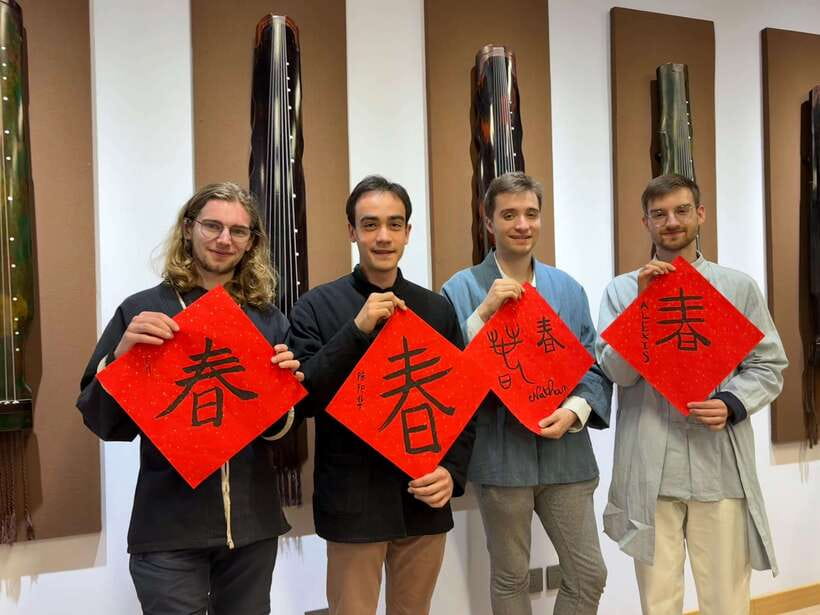 Beijing Hands-On Culture Tour: Tea, Instrument, Calligraphy - Hanfu clothing and photographs