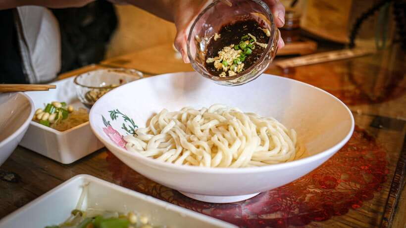 Beijing: Hidden Gems Guided Food Tour with Beer and Tastings - Copper-pot hotpot with a bell tower view