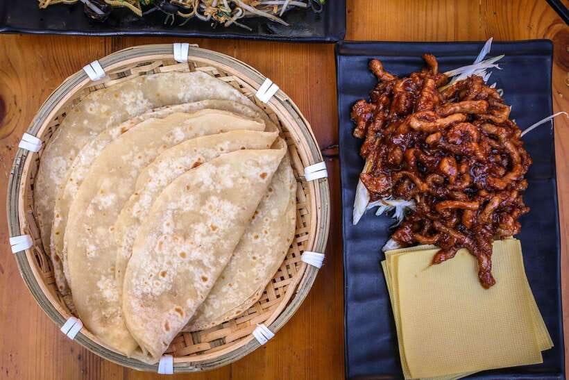Beijing: Hidden Gems Guided Food Tour with Beer and Tastings - What the food coverage means for your budget