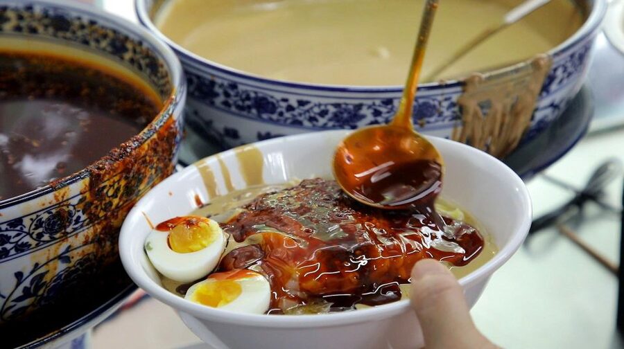 Beijing: Hutong Culinary Walking Tour with 15+ Tastings - Sweet starts and crisp street snacks