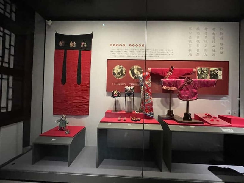 Beijing: Hutongs & Food & Culture Walking Tour - Tea, paper cutting, calligraphy, and Peking Opera