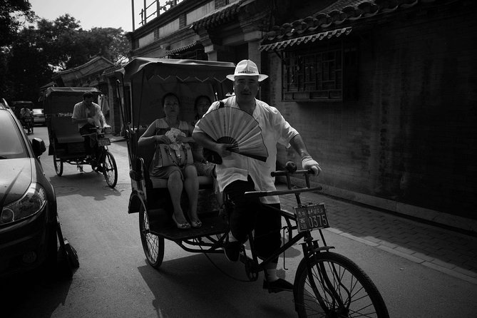 Beijing Old Hutongs Tour by Rickshaw - Riding through the narrow hutongs