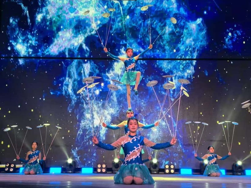 Beijing: Qinle Palace Acrobatics Show Ticket - Aerial silk, hoop dances, and floating star disks