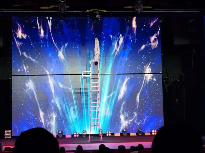 Beijing: Qinle Palace Acrobatics Show Ticket - Giant flying wheels and globe motorcycles