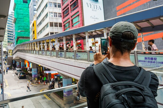 Between Capitalism & Communism: Hong Kong History Tip Based Tour - Mid-Levels Escalator: engineering shaped by the hills