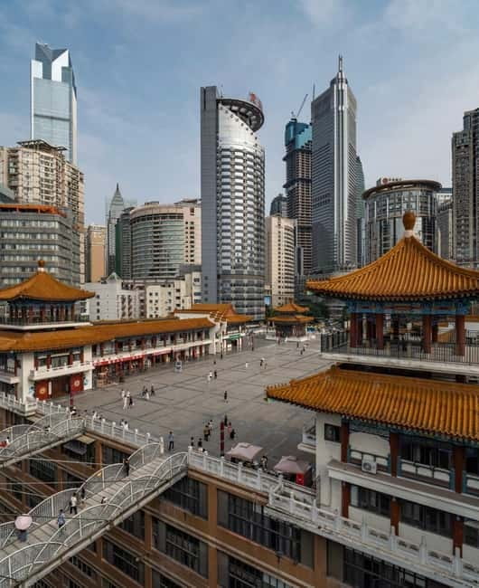 Chongqing: Surreal Urban, Ancient Town, and Secret Viewpoint - Liziba, where the train enters the apartment block
