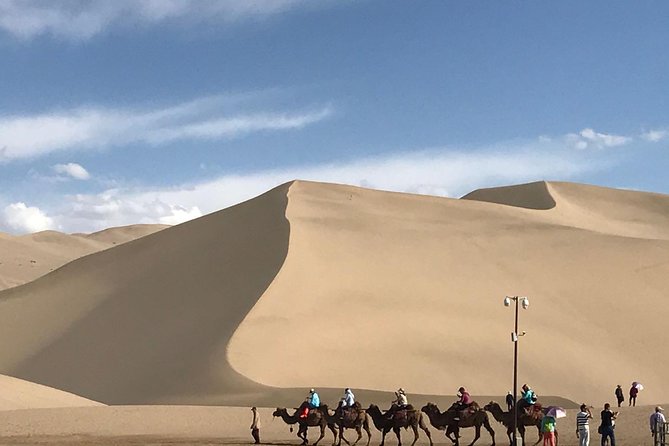 Dunhuang Private Day Tour Mogao Grottoes, Singing Dunes and Crescent Moon Spring - Starting at 8:00 am from your Dunhuang hotel