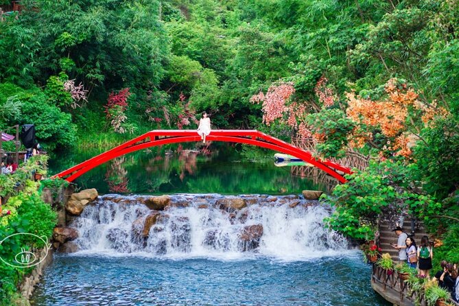 Gulong Gorge Glass Bridge and Underground River Cave Private Tour - Entering Jinlong Cave beside an underground river