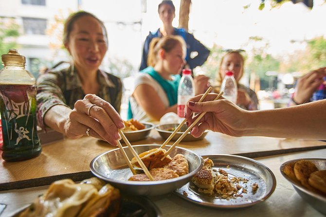 Half-Day Bike Tour of Shanghai Old Town with Food Tasting - Wet market stops and food that feels local