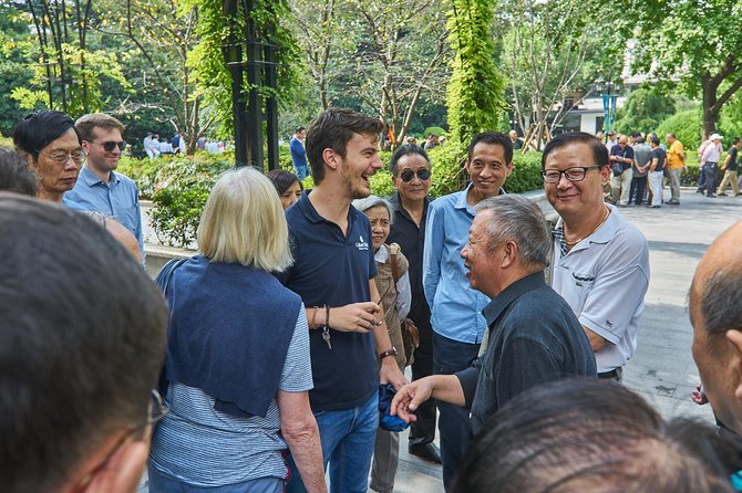 Half-Day Bike Tour of Shanghai Old Town with Food Tasting - Fuxing Park and Shanghai’s morning routines