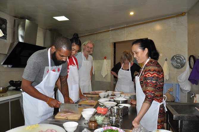 Half-Day Sichuan Cooking Class Experience in Chengdu - Learning in a home kitchen, cafe, or hostel