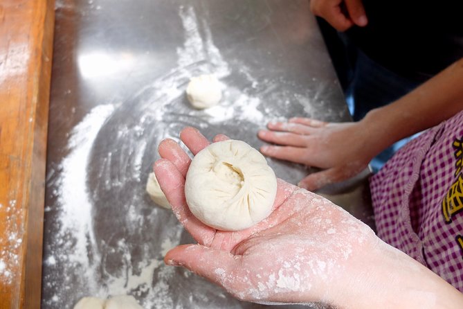 Half-Day steamed Buns Cooking Class with a Local Market Visit - Stop one: Chilli Cool China and the local spice market
