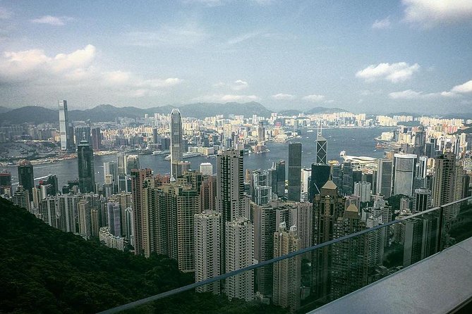 Hong Kong Afternoon Sightseeing Tour Plus Dinner Cruise with Hotel Pickup from Kowloon area - Riding the Peak Tram above Hong Kong