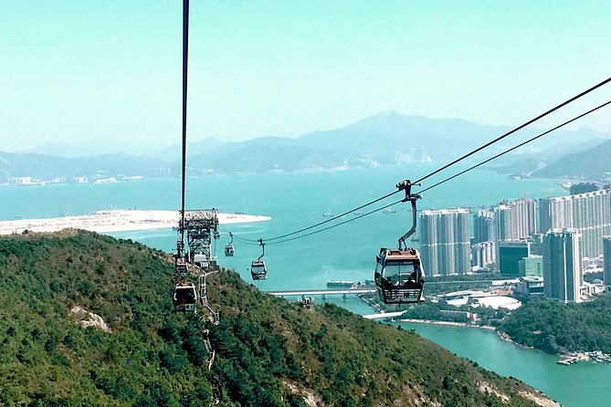 Hong Kong Lantau Tour with Big Buddha, Tai O Village & Snacks - Ngong Ping Village gives you a short pause