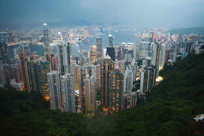 Hong Kong Layover Tour Private & Personalized with Local Guide - Riding the double-decker tram toward Kennedy Town