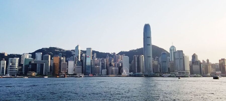 Hong Kong: Victoria Harbour Day or Sunset Cruise - Reading Hong Kong’s skyline from the Eastern Harbour