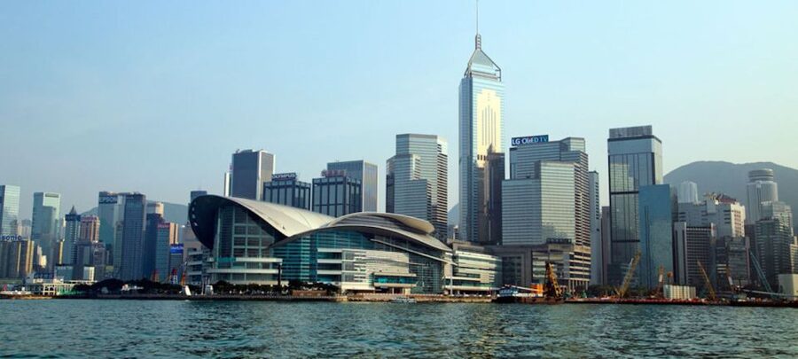 Hong Kong: Victoria Harbour Day or Sunset Cruise - Crew service and taking photos