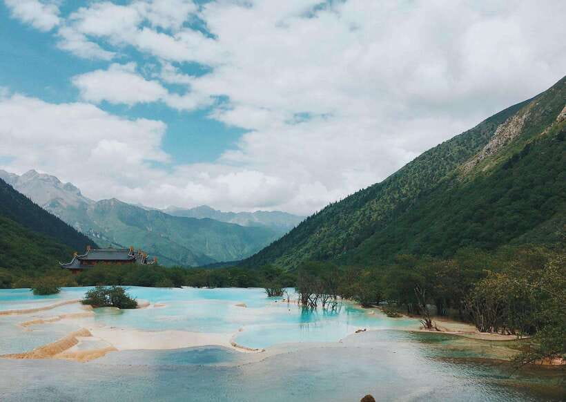Huanglong Scenic Area: Explore Stunning Five-Colored Ponds - Who Will Enjoy This Most