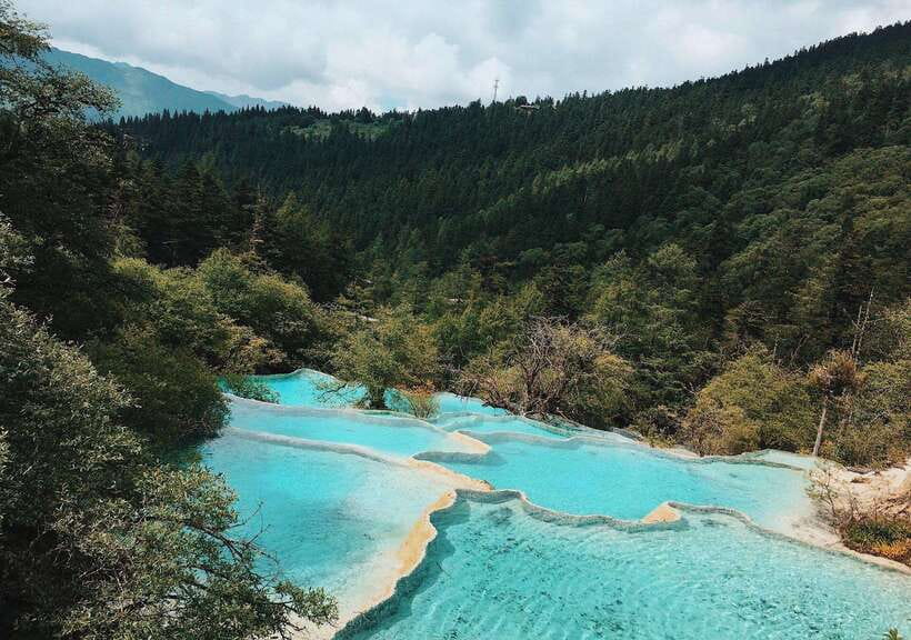 Huanglong Scenic Area: Explore Stunning Five-Colored Ponds - What to Bring for a Comfortable Visit