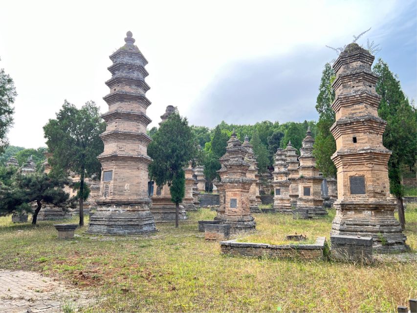 Luoyang Private Day Tour to Shaolin Temple&Longmen Grottoes - Walking the Longmen Grottoes