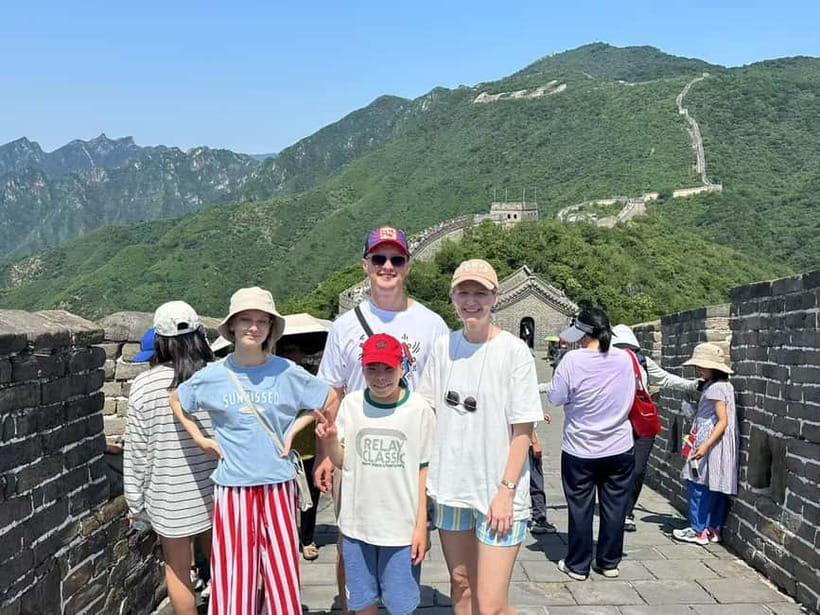 Morning Bus Transfer to Mutianyu Great Wall + Entry Ticket - Entering Mutianyu with the ticket and shuttle included