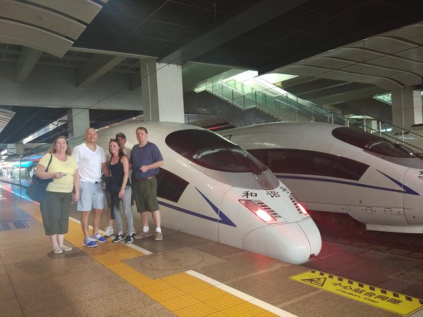 Private Day Trip: Discover Tianjin by Bullet Train from Beijing - Tianjin Eye, a Ferris wheel above a bridge