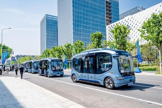 Private Guangzhou High-Tech Tour AI Robot Auto Drive Bus and More - Alibaba’s cashless supermarket