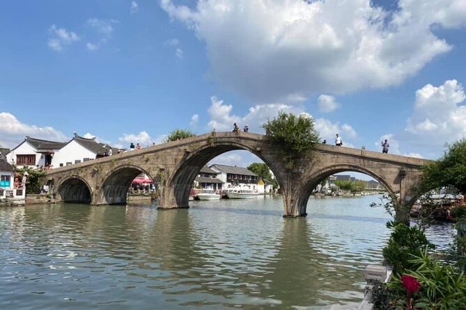 Private Half Day Tour: Zhujiajiao Water Town with Gondola Ride - Walking among canals, stone streets, and old buildings