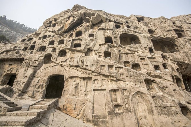 Private Luoyang Day Tour: Longmen Grottoes and White Horse Temple - Longmen Grottoes: China’s great riverbank gallery