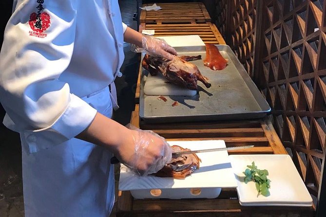 Private Tour to Pearl Market Acrobatic Show & Peking Duck Dinner - Who will enjoy this Beijing evening most?