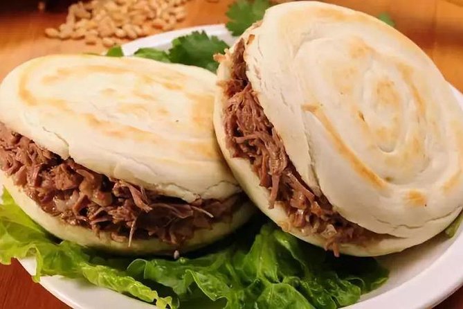 Private Xi'an Foodie Tour by Tuktuk - Five or six eateries, with dishes worth watching