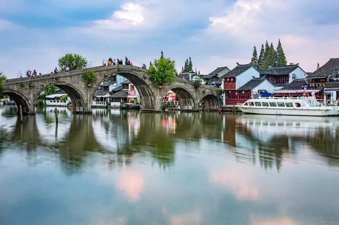 Private Zhujiajiao Water Town Tour with Shanghai Zoo and Panda - The guides are a major part of the value