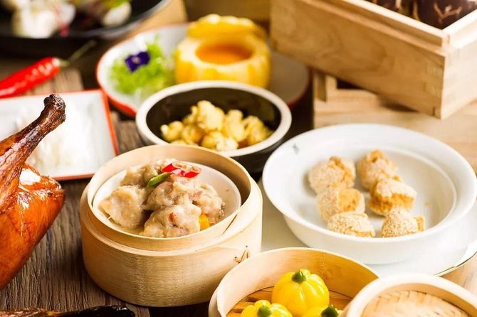 Shanghai Acrobatic Show and Late Dim Sum Dinner - The 6:30 p.m. hotel pickup keeps the evening easy
