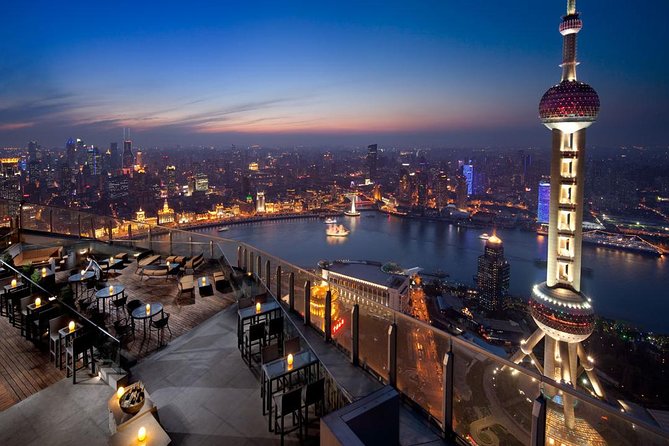 Shanghai Authentic Dinner and Night River Cruise with Rooftop Bar Hopping Option - Starting with soup dumplings and local dishes