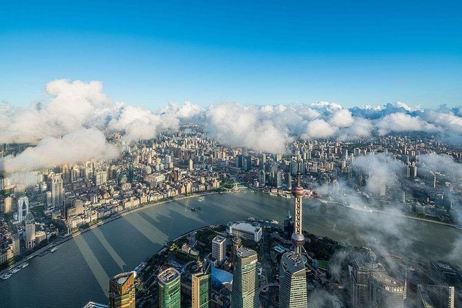 Shanghai Private Tour with River Cruise, Shanghai Tower, and Lunch or Dinner - Huangpu River cruise between old and new Shanghai
