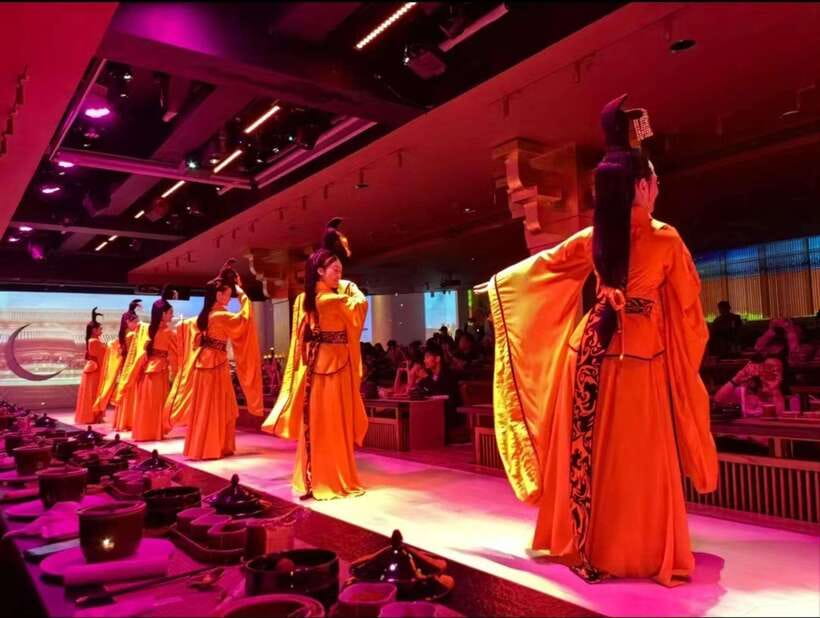 Shanghai: Royal Banquet with Chinese Cultural Performance - Adding traditional clothing, hair, and makeup