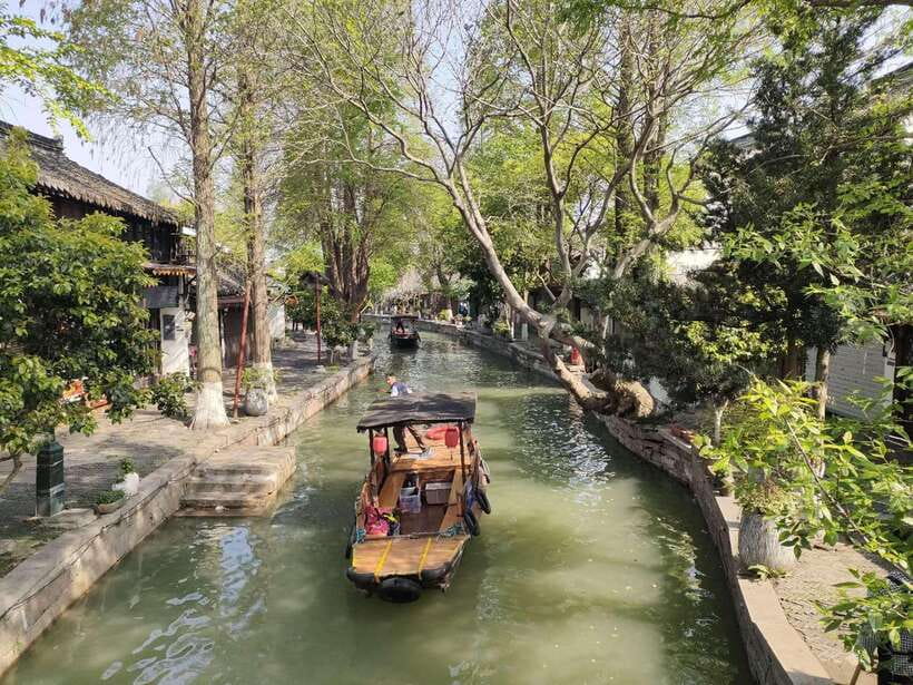 Shanghai: Zoo and Zhujiajiao Water Town Tour with Boat Ride - Walking across the bridges and old lanes