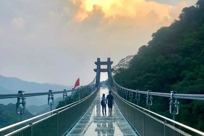 Skywalk Glass Bridge and Waterfall Ravine Half Day Private Tour - Crossing the 1.5-kilometer glass bridge