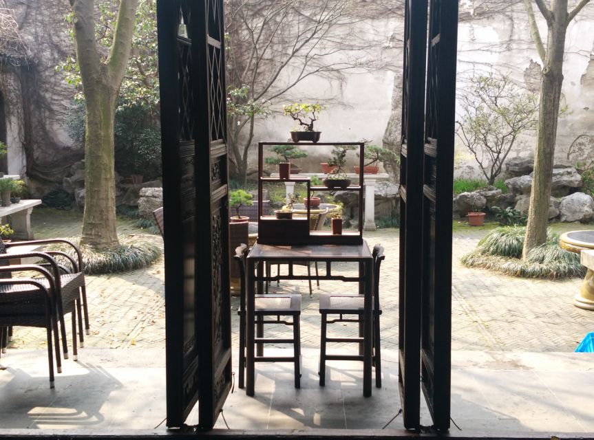Su Zhou and Zhou Zhuang Water Village Day Tour - Suzhou and the Master of Nets Garden