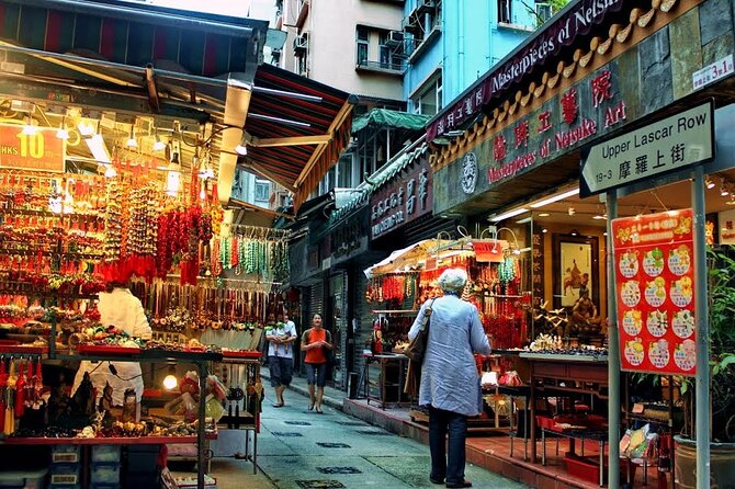 Top-Rated Hong Kong Tour: Peak Tram, Dim Sum & Cultural Sights - Hollywood Road and Pottinger Street show two different sides of Central