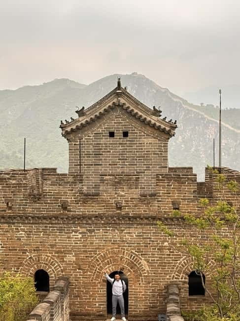 Water-Great Wall Odyssey: Hike & Cruise One Day Tour - Walking the Wall above the reservoir