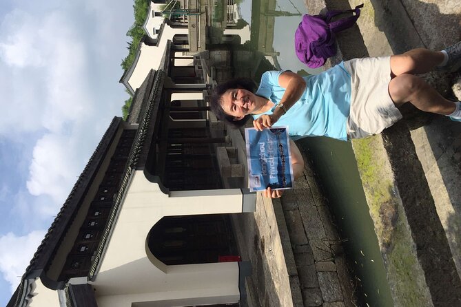 Wuzhen Water Town Delight Tour With Riverside Lunch Experience - Riverside lunch and the all-inclusive choice