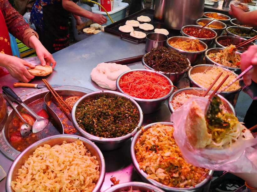 Xi'an: City Wall & Old Town Walking Tour w/ 10+ Food Tasting - The East Gate is the evening payoff